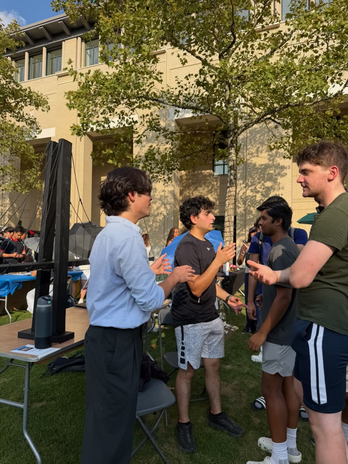 Industrial Club members talking with students at the CMU club fair